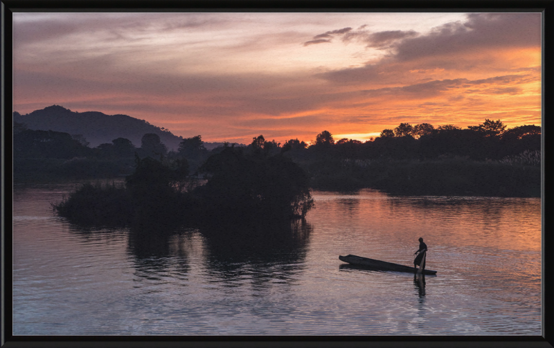 Fisherman Standing on His Pirogue in Laos - Great Pictures Framed