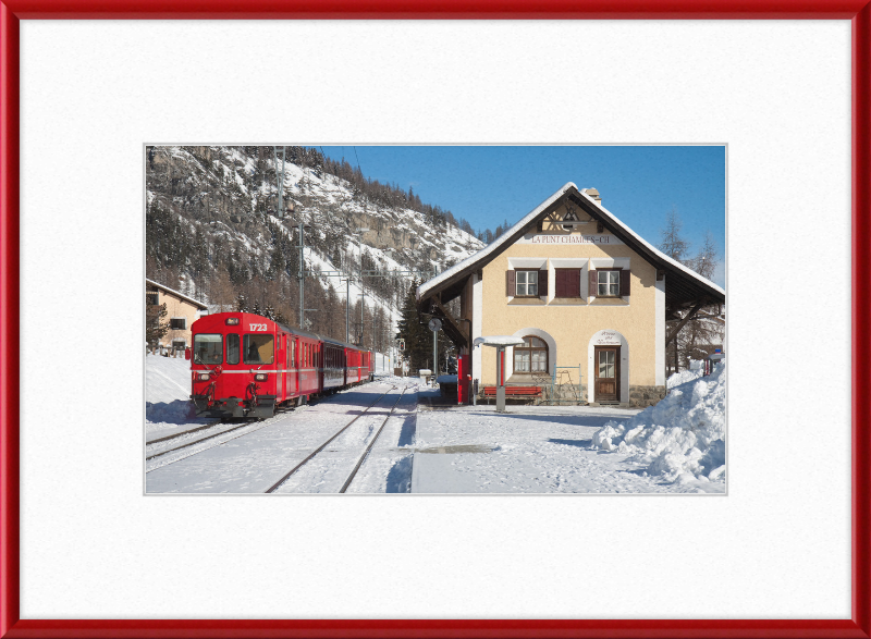 A Train Going Past a Station in Switzerland - Great Pictures Framed