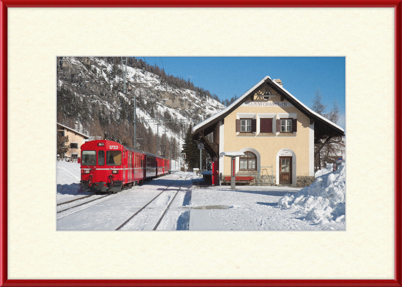 A Train Going Past a Station in Switzerland - Great Pictures Framed