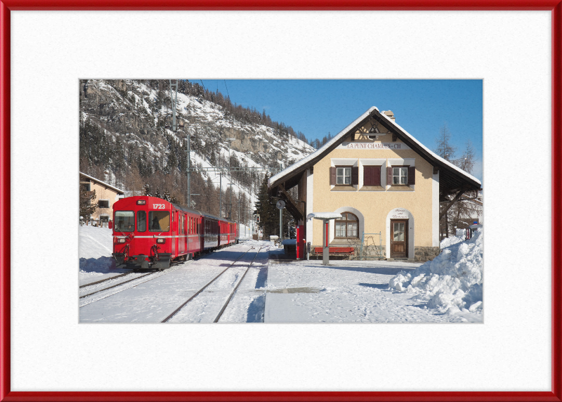 A Train Going Past a Station in Switzerland - Great Pictures Framed