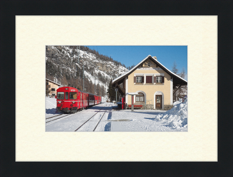 A Train Going Past a Station in Switzerland - Great Pictures Framed
