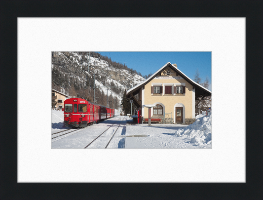A Train Going Past a Station in Switzerland - Great Pictures Framed