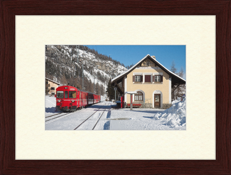 A Train Going Past a Station in Switzerland - Great Pictures Framed