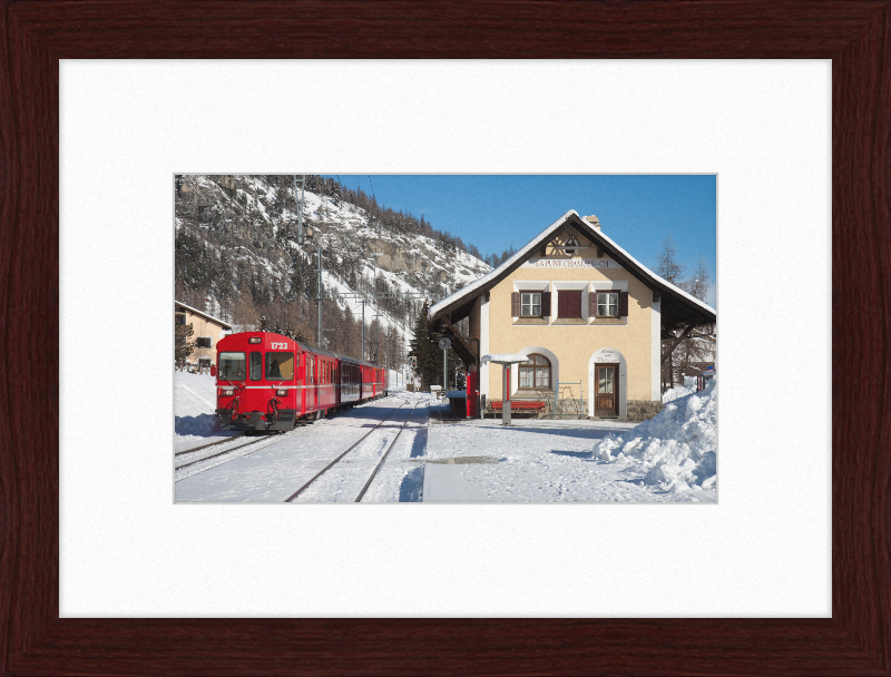 A Train Going Past a Station in Switzerland - Great Pictures Framed