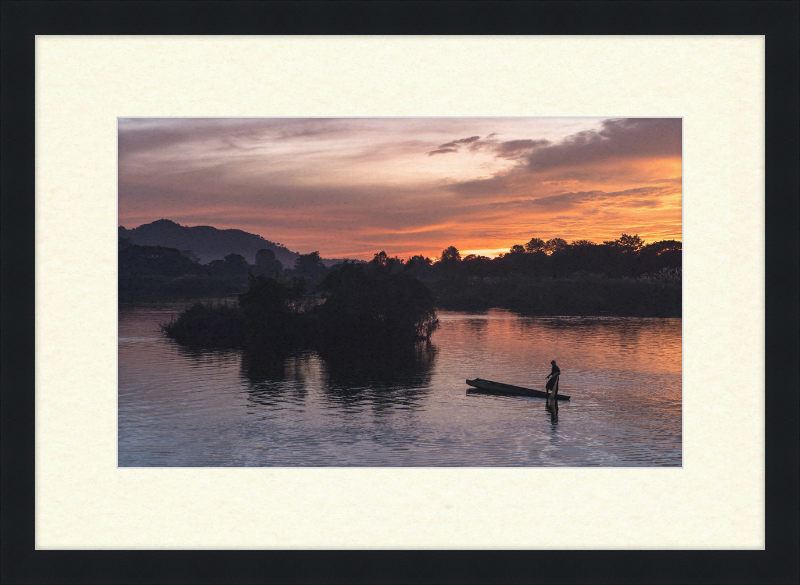 Fisherman Standing on His Pirogue in Laos - Great Pictures Framed
